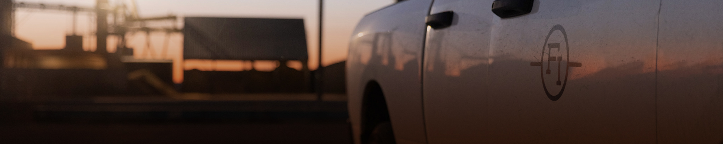 Friona logo on the side of a white truck